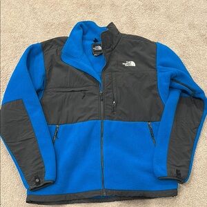 The North Face Blue and Black Performance Jacket with Sporty Design